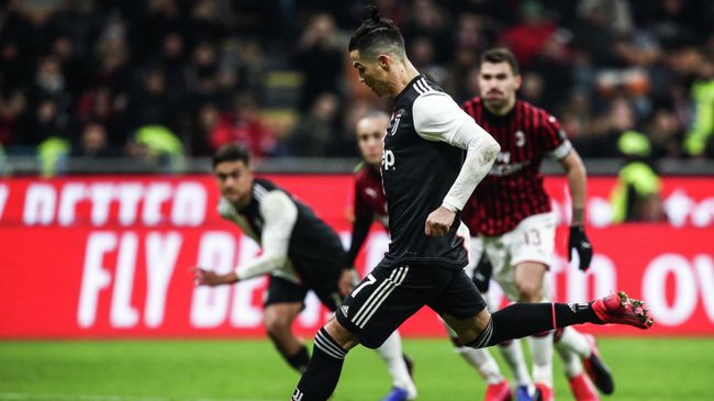 Juventus' Portuguese forward Cristiano Ronaldo shoots to score a penalty and equalize during the Italian Cup (Coppa Italia) semi-final first leg football match AC Milan vs Juventus Turin on February 13, 2020 at the San Siro stadium in Milan. (Photo by Isabella BONOTTO / AFP) Juventus' Portuguese forward Cristiano Ronaldo shoots to score a penalty and equalize during the Italian Cup (Coppa Italia) semi-final first leg football match AC Milan vs Juventus Turin on February 13, 2020 at the San Siro stadium in Milan. (Photo by Isabella BONOTTO / AFP)