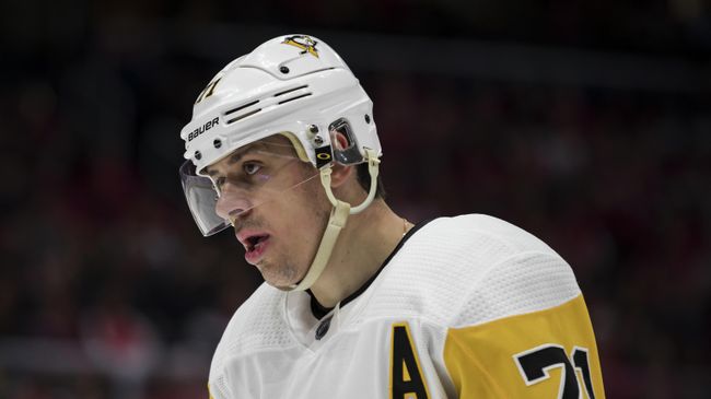 WASHINGTON, DC - FEBRUARY 02: Evgeni Malkin #71 of the Pittsburgh Penguins looks on during the second period of the game against the Washington Capitals at Capital One Arena on February 2, 2020 in Washington, DC. Scott Taetsch/Getty Images/AFP WASHINGTON, DC - FEBRUARY 02: Evgeni Malkin #71 of the Pittsburgh Penguins looks on during the second period of the game against the Washington Capitals at Capital One Arena on February 2, 2020 in Washington, DC. Scott Taetsch/Getty Images/AFP