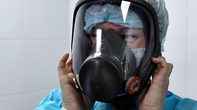 Медик в защитной маске Медик в защитной маске