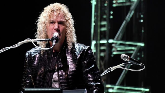 Клавишник и бэк-вокалист американской рок-группы Bon Jovi Дэвид Брайан Клавишник и бэк-вокалист американской рок-группы Bon Jovi Дэвид Брайан