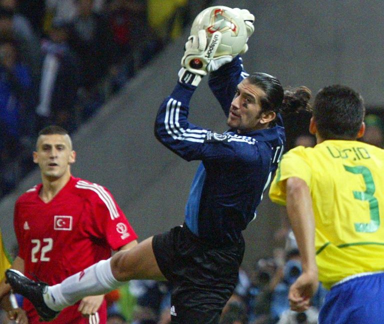 Рюштю Речбер (в центре) на чемпионате мира 2002 года