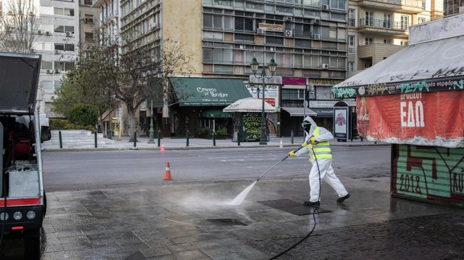 Сотрудник коммунальной службы в Афинах Сотрудник коммунальной службы в Афинах