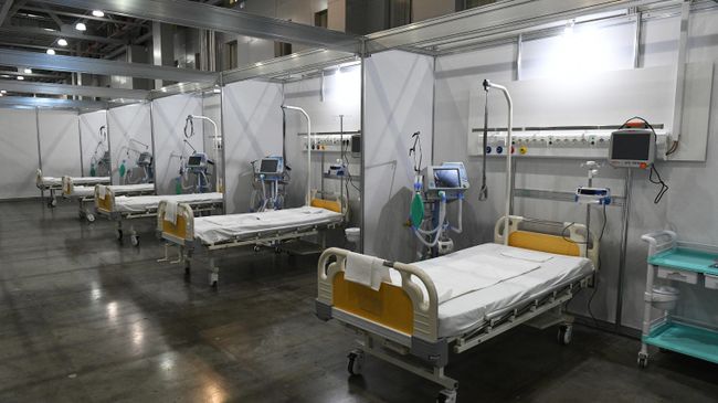 Палаты во временном госпитале для пациентов с COVID-19 в Международном выставочном центре Крокус Экспо в Красногорске Палаты во временном госпитале для пациентов с COVID-19 в Международном выставочном центре Крокус Экспо в Красногорске