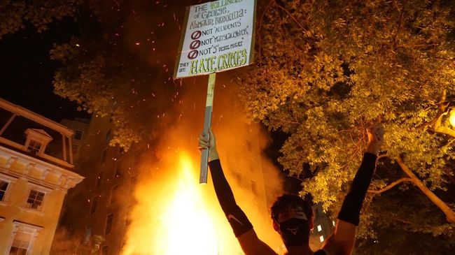 Протестующий в Вашингтоне Протестующий в Вашингтоне