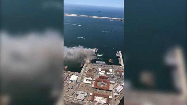 Кадры горящего корабля ВМС США в порту Сан-Диего Кадры горящего корабля ВМС США в порту Сан-Диего