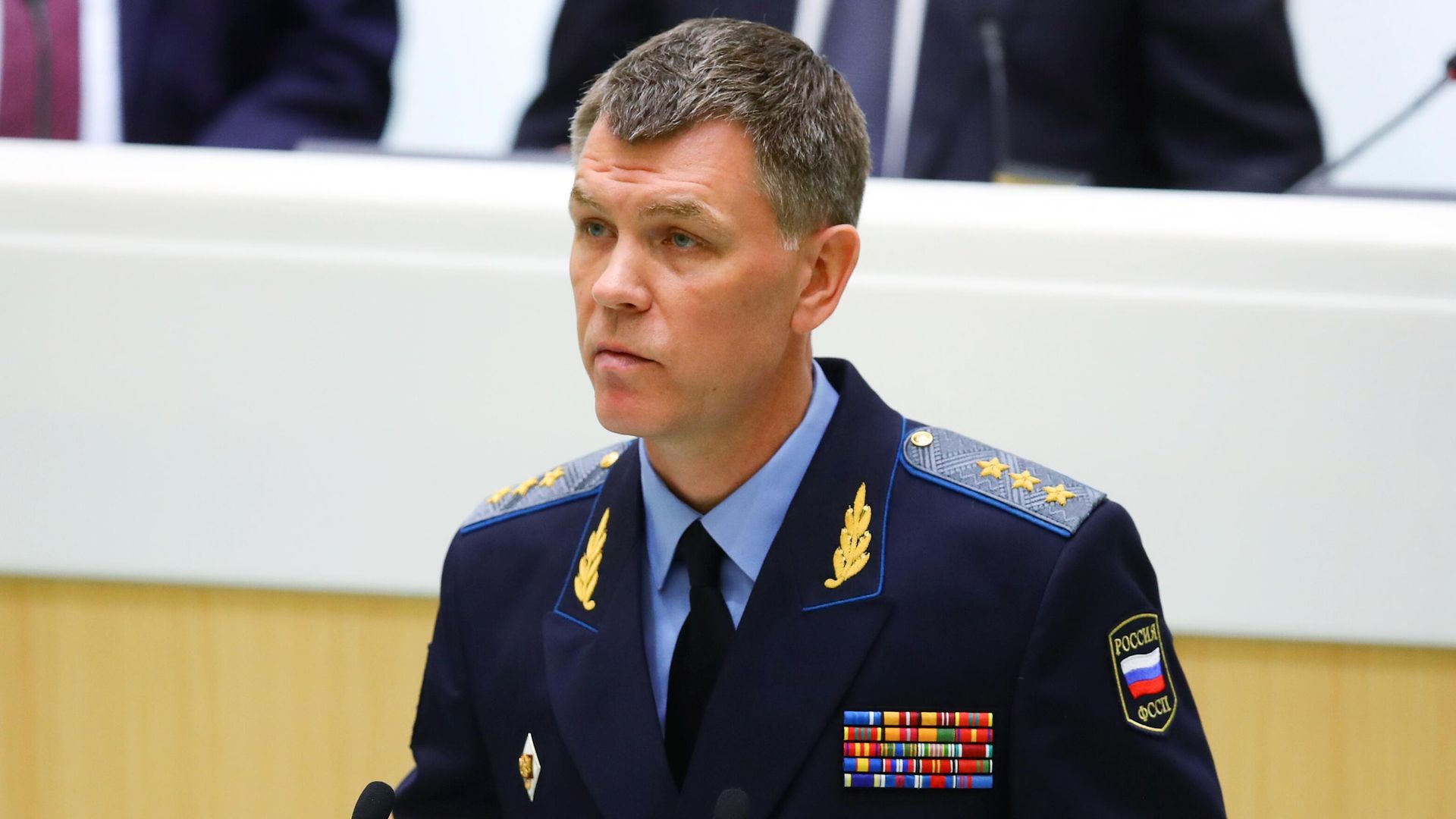 Директор Федеральной службы судебных приставов РФ Дмитрий Аристов выступает на пленарном заседании Совета Федерации РФ в Москве  - РИА Новости, 1920