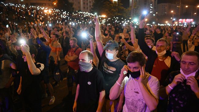 Участники акции протеста на одной из улиц в Минске Участники акции протеста на одной из улиц в Минске