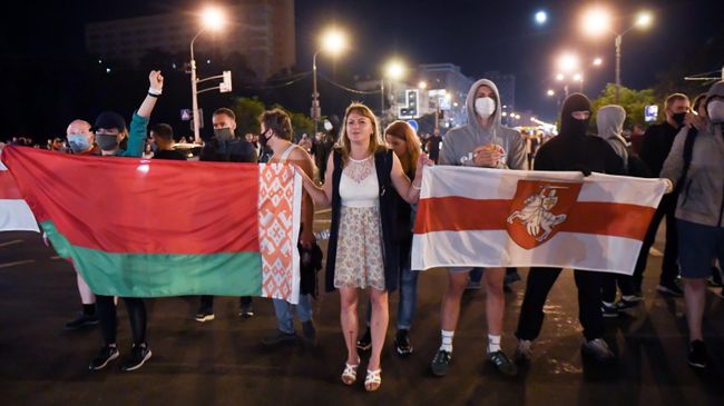 Участники акции протеста на одной из улиц в Минске Участники акции протеста на одной из улиц в Минске