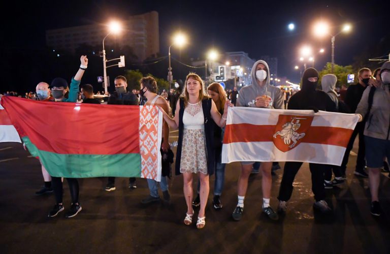 Участники акции протеста на одной из улиц в Минске Участники акции протеста на одной из улиц в Минске