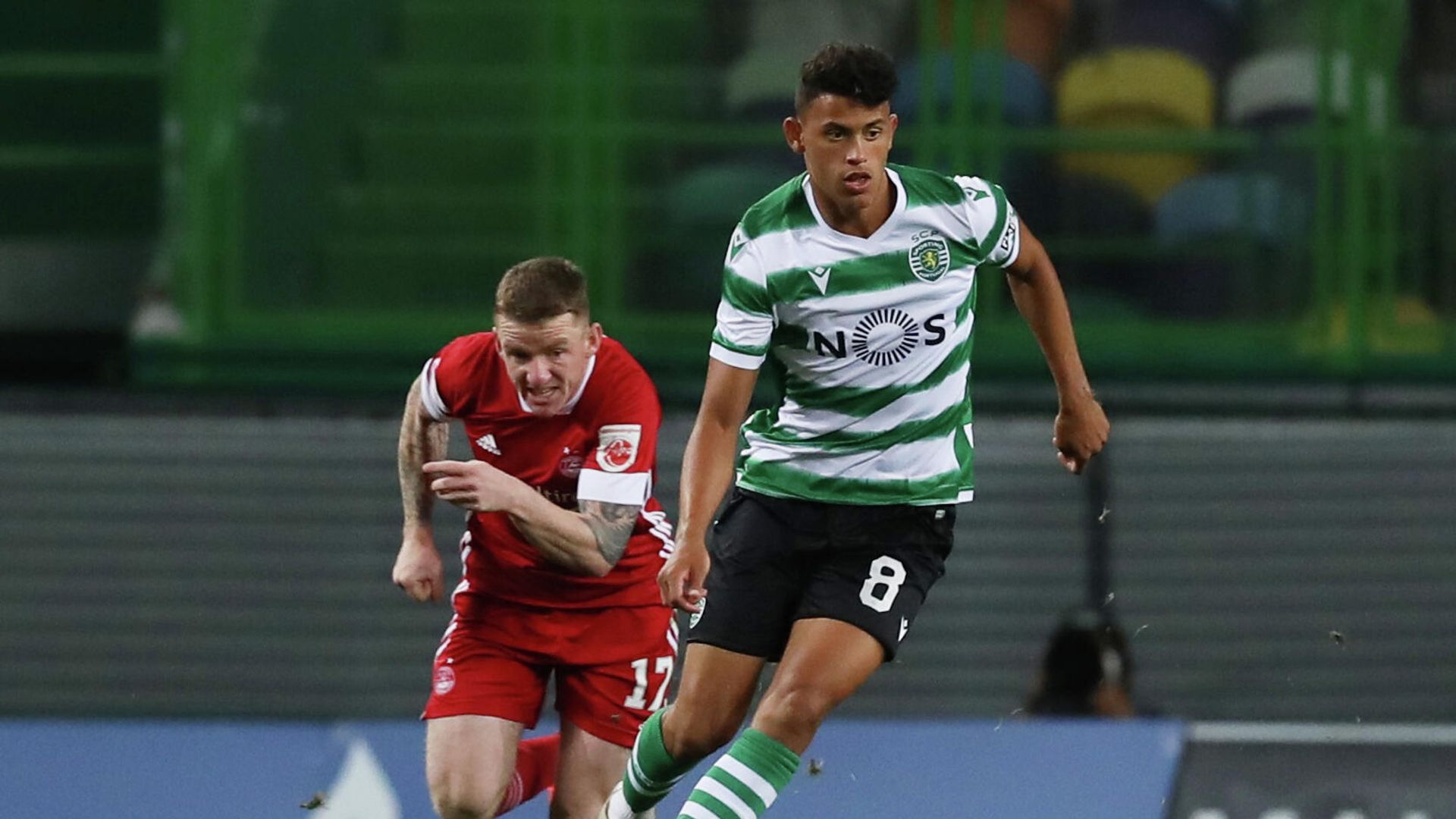 Soccer Football - Europa League - Third qualifying round - Sporting CP v Aberdeen - Estadio Jose Alvalade, Lisbon, Portugal - September 24, 2020 Sporting CP's Matheus Nunes in action with Aberdeen's Jonny Hayes REUTERS/Pedro Nunes Soccer Football - Europa League - Third qualifying round - Sporting CP v Aberdeen - Estadio Jose Alvalade, Lisbon, Portugal - September 24, 2020 Sporting CP's Matheus Nunes in action with Aberdeen's Jonny Hayes REUTERS/Pedro Nunes - РИА Новости, 1920, 25.09.2020