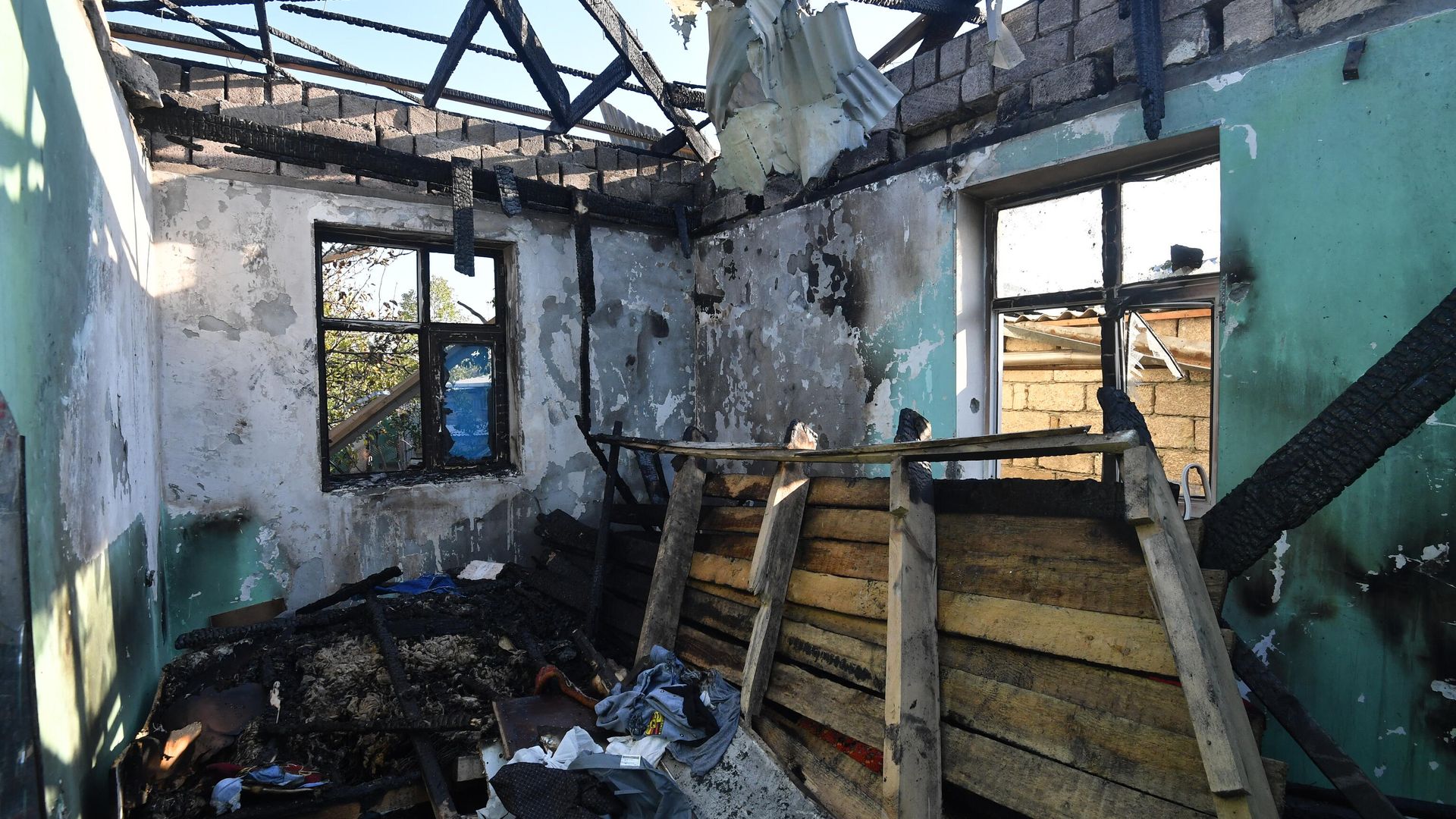 Жилой дом, разрушенный в результате обстрелов в Агдамском районе - РИА Новости, 1920, 14.10.2020