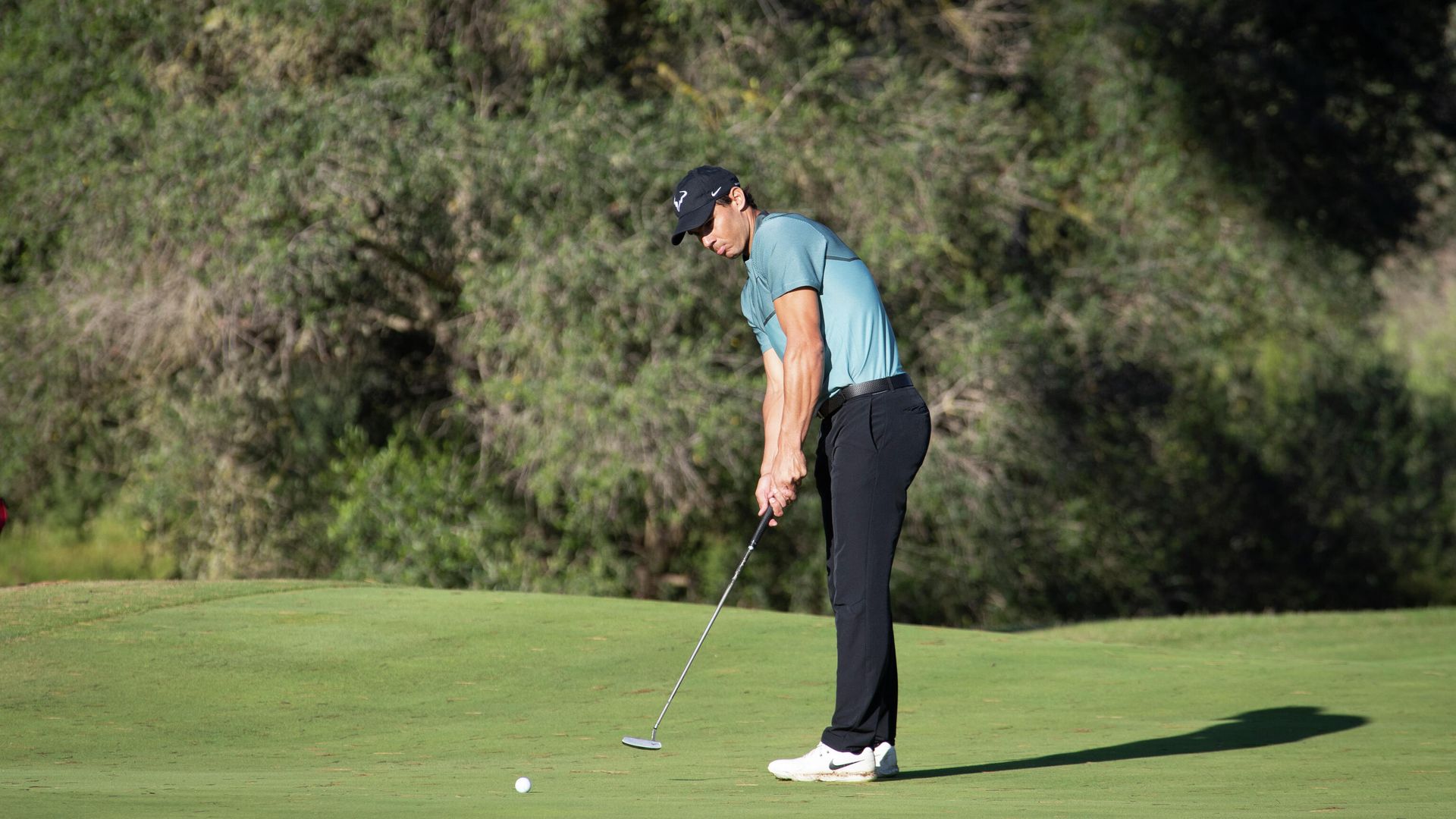 Spanish tennis champion Rafael Nadal takes part in the Balearic Golf Championship in Llucmajor on the Spanish island of Mallorca on October 24, 2020. (Photo by JAIME REINA / AFP) Spanish tennis champion Rafael Nadal takes part in the Balearic Golf Championship in Llucmajor on the Spanish island of Mallorca on October 24, 2020. (Photo by JAIME REINA / AFP) - РИА Новости, 1920, 26.10.2020