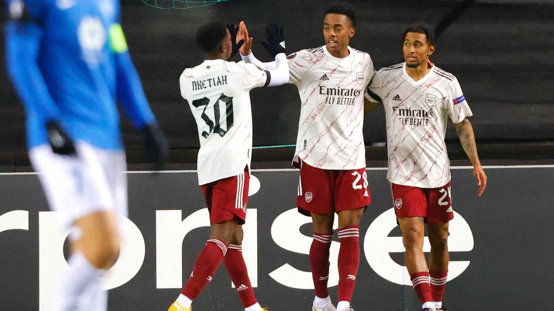 Arsenal's English midfielder Reiss Nelson (R) celebrates with Arsenal's English striker Eddie Nketiah (L) and Arsenal's English midfielder Joe Willock (R) after scoring the 0-2 during the UEFA Europa League group B football match Molde v Arsenal in Molde, Norway on November 26, 2020. (Photo by Svein Ove Ekornesvеg / NTB / AFP) / Norway OUT Arsenal's English midfielder Reiss Nelson (R) celebrates with Arsenal's English striker Eddie Nketiah (L) and Arsenal's English midfielder Joe Willock (R) after scoring the 0-2 during the UEFA Europa League group B football match Molde v Arsenal in Molde, Norway on November 26, 2020. (Photo by Svein Ove Ekornesvеg / NTB / AFP) / Norway OUT - РИА Новости, 1920, 26.11.2020