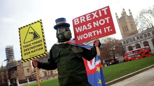 Участник акции протеста против Brexit в центре Лондона Участник акции протеста против Brexit в центре Лондона