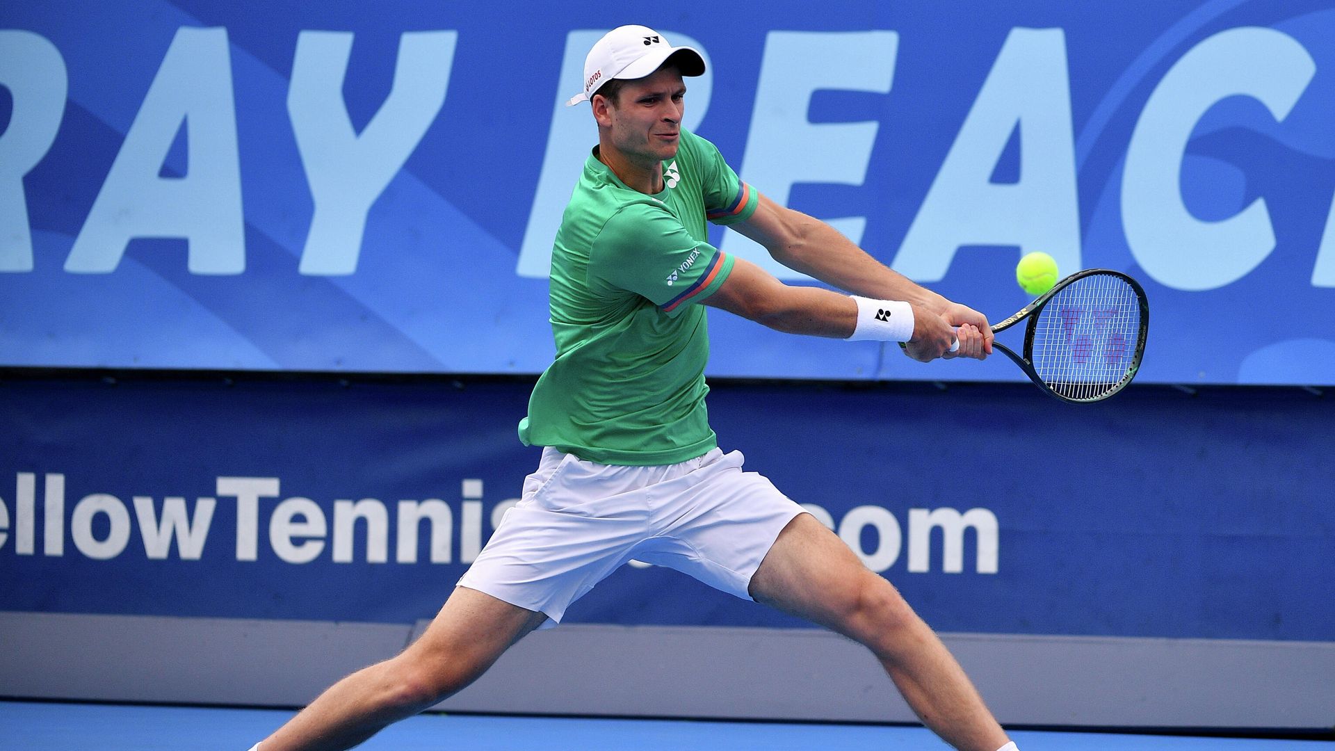 DELRAY BEACH, FLORIDA - JANUARY 11: Hubert Hurkacz of Poland plays a backhand against Roberto Quiroz of Ecuador (not pictured) during the Quarterfinals of the Delray Beach Open by Vitacost.com at Delray Beach Tennis Center on January 11, 2021 in Delray Beach, Florida. Mark Brown/Getty Images/AFP DELRAY BEACH, FLORIDA - JANUARY 11: Hubert Hurkacz of Poland plays a backhand against Roberto Quiroz of Ecuador (not pictured) during the Quarterfinals of the Delray Beach Open by Vitacost.com at Delray Beach Tennis Center on January 11, 2021 in Delray Beach, Florida. Mark Brown/Getty Images/AFP - РИА Новости, 1920, 13.01.2021