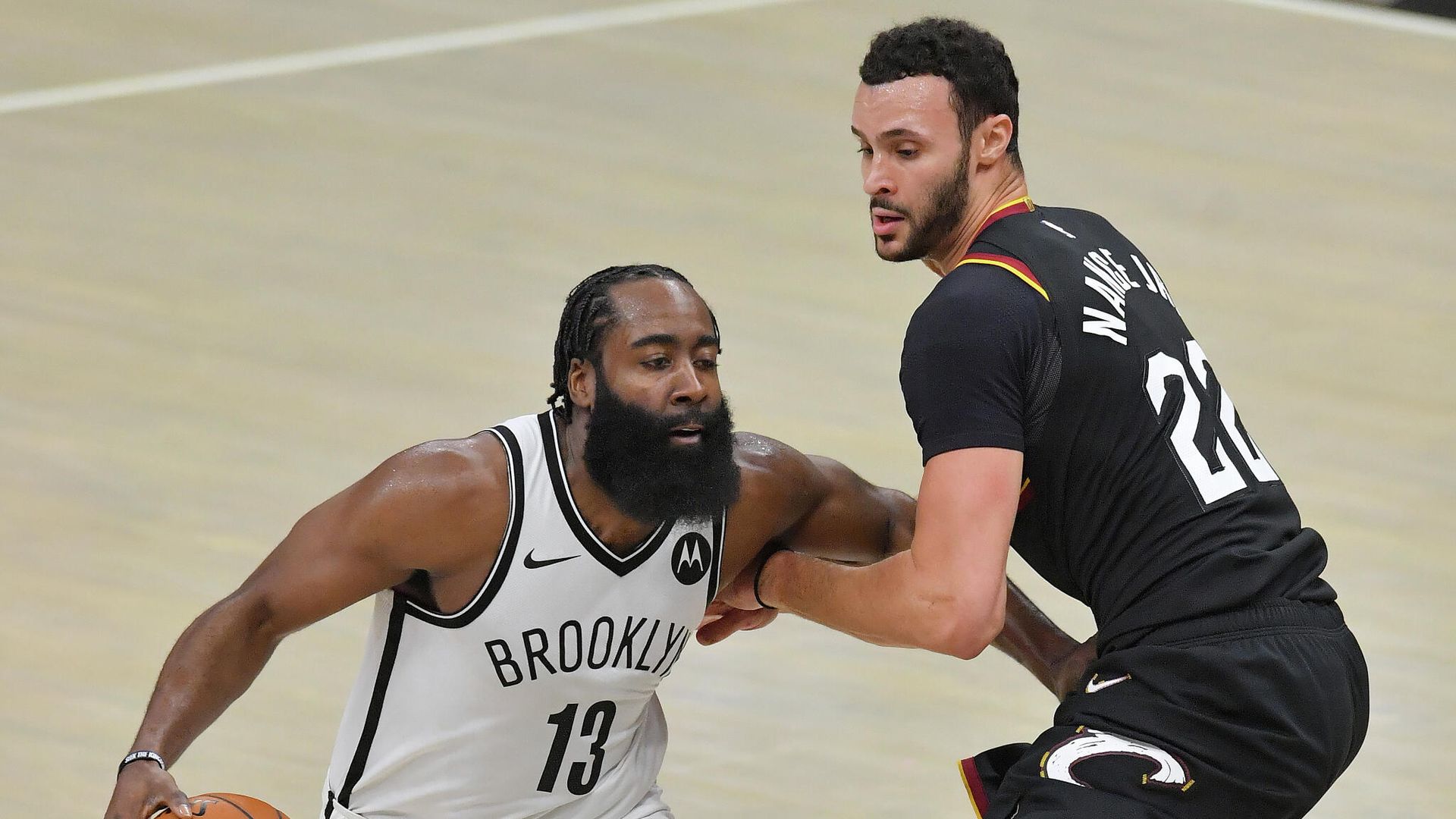 CLEVELAND, OHIO - JANUARY 20: James Harden #13 of the Brooklyn Nets drives around Larry Nance Jr. #22 of the Cleveland Cavaliers during the third quarter at Rocket Mortgage Fieldhouse on January 20, 2021 in Cleveland, Ohio. NOTE TO USER: User expressly acknowledges and agrees that, by downloading and/or using this photograph, user is consenting to the terms and conditions of the Getty Images License Agreement.   Jason Miller/Getty Images/AFP - РИА Новости, 1920, 21.01.2021