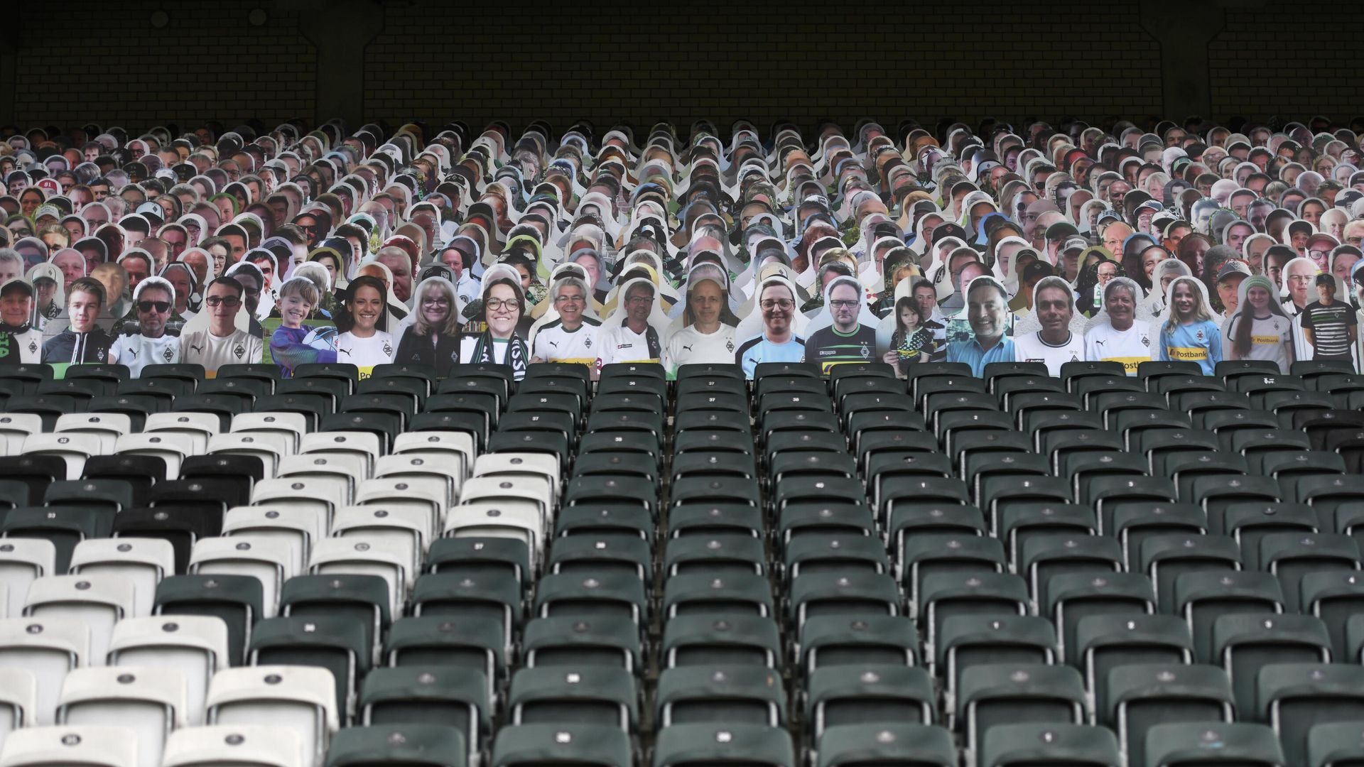 Cardboard pictures of fans are pictures ahead the German first division Bundesliga football match Borussia Moenchengladbach v Bayer 04 Leverkusen on May 23, 2020 in Moenchengladbach, western Germany. (Photo by Ina FASSBENDER / various sources / AFP) / DFL REGULATIONS PROHIBIT ANY USE OF PHOTOGRAPHS AS IMAGE SEQUENCES AND/OR QUASI-VIDEO Cardboard pictures of fans are pictures ahead the German first division Bundesliga football match Borussia Moenchengladbach v Bayer 04 Leverkusen on May 23, 2020 in Moenchengladbach, western Germany. (Photo by Ina FASSBENDER / various sources / AFP) / DFL REGULATIONS PROHIBIT ANY USE OF PHOTOGRAPHS AS IMAGE SEQUENCES AND/OR QUASI-VIDEO - РИА Новости, 1920, 21.01.2021
