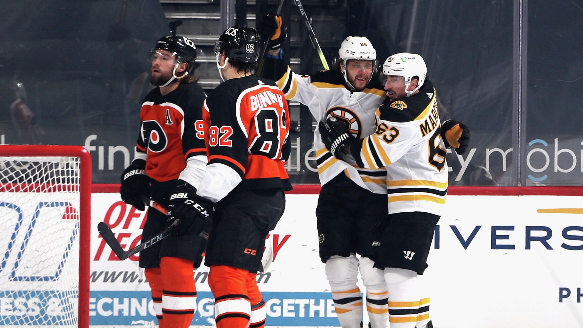 PHILADELPHIA, PENNSYLVANIA - FEBRUARY 03: David Pastrnak #88 of the Boston Bruins (L) and Brad Marchand #63 (R) celebrate Pasternak's goal at 12 seconds of the first period against the Philadelphia Flyers at Wells Fargo Center on February 03, 2021 in Philadelphia, Pennsylvania. Bruce Bennett/Getty Images/AFP PHILADELPHIA, PENNSYLVANIA - FEBRUARY 03: David Pastrnak #88 of the Boston Bruins (L) and Brad Marchand #63 (R) celebrate Pasternak's goal at 12 seconds of the first period against the Philadelphia Flyers at Wells Fargo Center on February 03, 2021 in Philadelphia, Pennsylvania. Bruce Bennett/Getty Images/AFP - РИА Новости, 1920, 04.02.2021