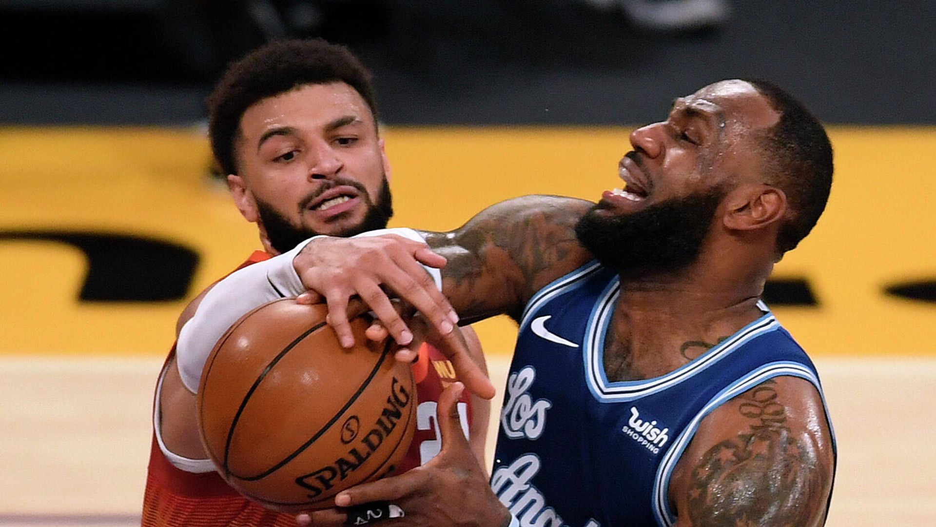 LOS ANGELES, CALIFORNIA - FEBRUARY 04: LeBron James #23 of the Los Angeles Lakers reacts as Jamal Murray #27 of the Denver Nuggets reaches in for the ball during the first half at Staples Center on February 04, 2021 in Los Angeles, California. NOTE TO USER: User expressly acknowledges and agrees that, by downloading and/or using this Photograph, user is consenting to the terms and conditions of the Getty Images License Agreement. Mandatory Copyright Notice: Copyright 2021 NBAE. Harry How/Getty Images/AFP LOS ANGELES, CALIFORNIA - FEBRUARY 04: LeBron James #23 of the Los Angeles Lakers reacts as Jamal Murray #27 of the Denver Nuggets reaches in for the ball during the first half at Staples Center on February 04, 2021 in Los Angeles, California. NOTE TO USER: User expressly acknowledges and agrees that, by downloading and/or using this Photograph, user is consenting to the terms and conditions of the Getty Images License Agreement. Mandatory Copyright Notice: Copyright 2021 NBAE. Harry How/Getty Images/AFP - РИА Новости, 1920, 05.02.2021