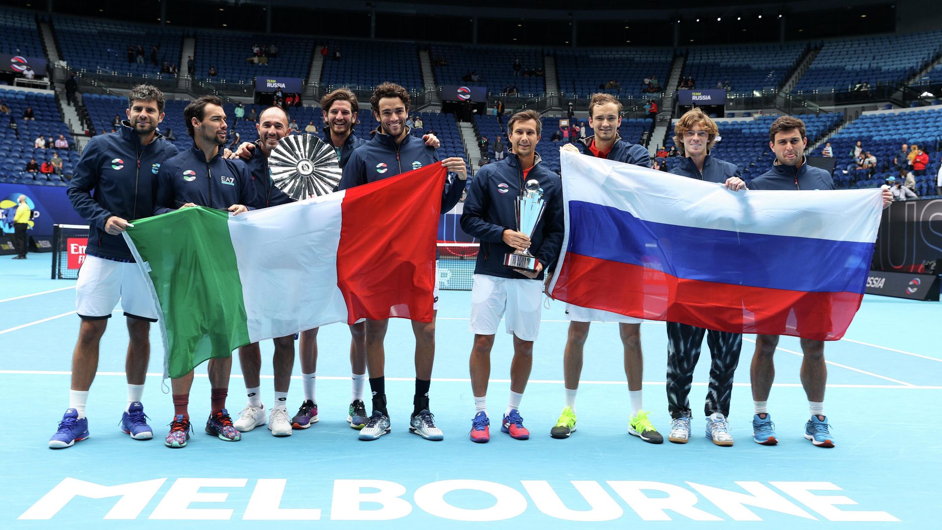 Tennis - ATP Cup - Melbourne Park, Melbourne, Australia, February 7, 2021 Russia's Daniil Medvedev, Andrey Rublev, Aslan Karatsev and Evgeny Donskoy celebrate winning the ATP Cup with the trophy after their final against Italy's Matteo Berrettini, Fabio Fognini, Simone Bolelli, Andrea Vavassori and captain Vincenzo Santopadre REUTERS/Loren Elliott Tennis - ATP Cup - Melbourne Park, Melbourne, Australia, February 7, 2021 Russia's Daniil Medvedev, Andrey Rublev, Aslan Karatsev and Evgeny Donskoy celebrate winning the ATP Cup with the trophy after their final against Italy's Matteo Berrettini, Fabio Fognini, Simone Bolelli, Andrea Vavassori and captain Vincenzo Santopadre REUTERS/Loren Elliott - РИА Новости, 1920, 07.02.2021