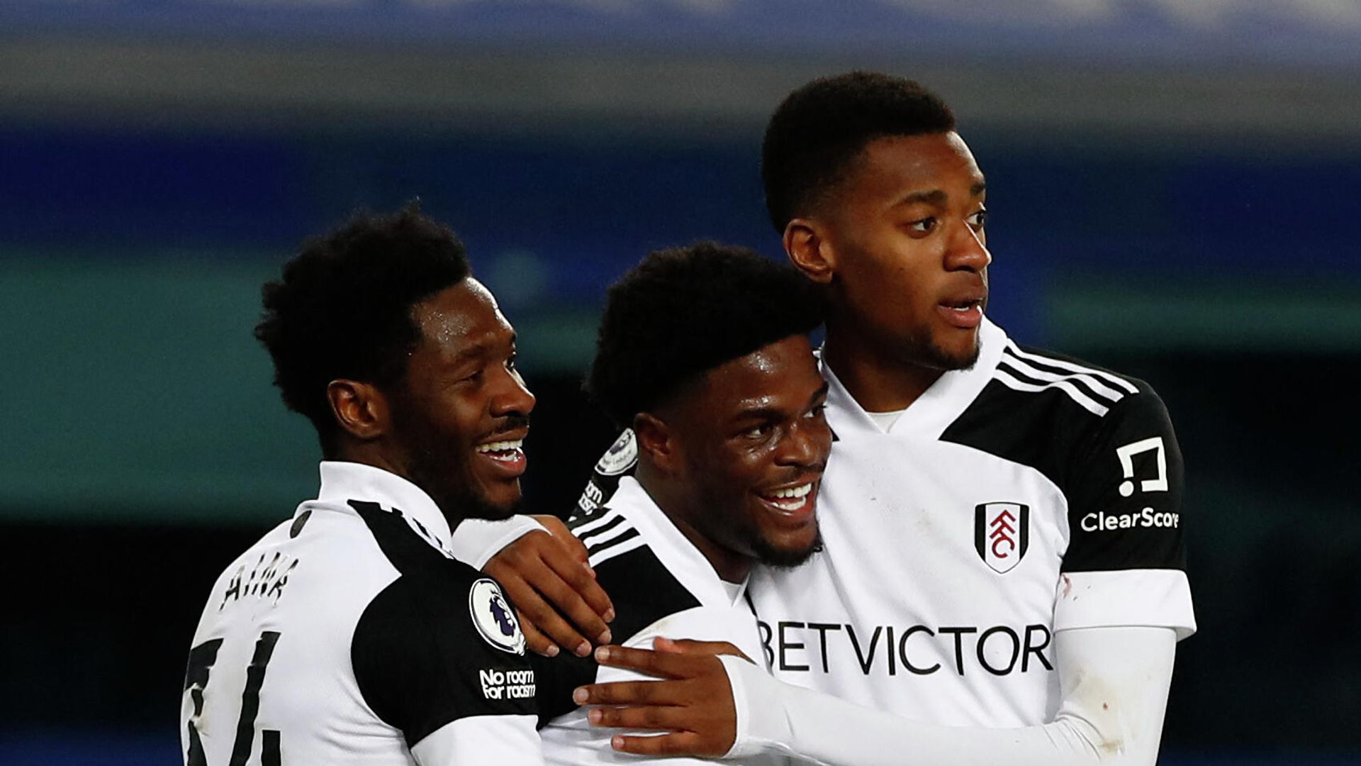 Fulham's Nigerian defender Ola Aina (L) and Fulham's English defender Tosin Adarabioyo (R) congratulate Fulham's Nigerian striker Josh Maja as he celebrates scoring his team's second goal during the English Premier League football match between Everton and Fulham at Goodison Park in Liverpool, north west England on February 14, 2021. (Photo by JASON CAIRNDUFF / POOL / AFP) / RESTRICTED TO EDITORIAL USE. No use with unauthorized audio, video, data, fixture lists, club/league logos or 'live' services. Online in-match use limited to 120 images. An additional 40 images may be used in extra time. No video emulation. Social media in-match use limited to 120 images. An additional 40 images may be used in extra time. No use in betting publications, games or single club/league/player publications. / Fulham's Nigerian defender Ola Aina (L) and Fulham's English defender Tosin Adarabioyo (R) congratulate Fulham's Nigerian striker Josh Maja as he celebrates scoring his team's second goal during the English Premier League football match between Everton and Fulham at Goodison Park in Liverpool, north west England on February 14, 2021. (Photo by JASON CAIRNDUFF / POOL / AFP) / RESTRICTED TO EDITORIAL USE. No use with unauthorized audio, video, data, fixture lists, club/league logos or 'live' services. Online in-match use limited to 120 images. An additional 40 images may be used in extra time. No video emulation. Social media in-match use limited to 120 images. An additional 40 images may be used in extra time. No use in betting publications, games or single club/league/player publications. / - РИА Новости, 1920, 15.02.2021