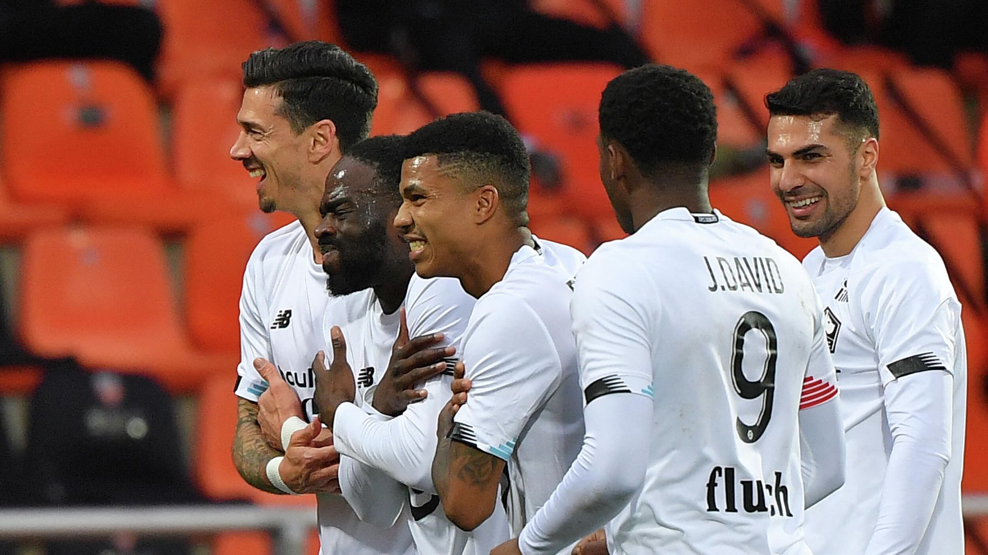 Lille's French midfielder Jonathan Ikone (2ndL) celebrates after scoring during the French L1 football match between FC Lorient and Lille at the Moustoir Stadium in Lorient, western France, on February 21, 2021. (Photo by LOIC VENANCE / AFP) Lille's French midfielder Jonathan Ikone (2ndL) celebrates after scoring during the French L1 football match between FC Lorient and Lille at the Moustoir Stadium in Lorient, western France, on February 21, 2021. (Photo by LOIC VENANCE / AFP) - РИА Новости, 1920, 21.02.2021