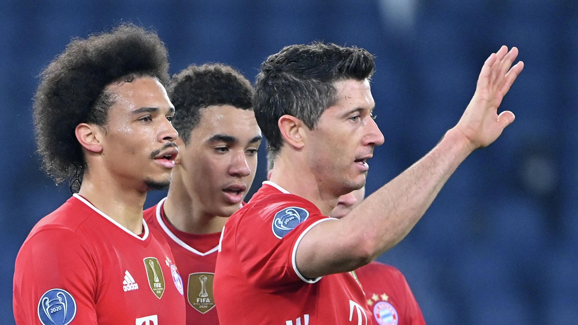 Bayern Munich's German midfielder Leroy Sane (L) celebrates with Bayern Munich's Polish forward Robert Lewandowski (R) and teammates after scoring the third goal during the UEFA Champions League round of 16 first leg football match Lazio Rome vs Bayern Munich on February 23, 2021 at the Olympic stadium in Rome. (Photo by Alberto PIZZOLI / AFP) Bayern Munich's German midfielder Leroy Sane (L) celebrates with Bayern Munich's Polish forward Robert Lewandowski (R) and teammates after scoring the third goal during the UEFA Champions League round of 16 first leg football match Lazio Rome vs Bayern Munich on February 23, 2021 at the Olympic stadium in Rome. (Photo by Alberto PIZZOLI / AFP) - РИА Новости, 1920, 24.02.2021