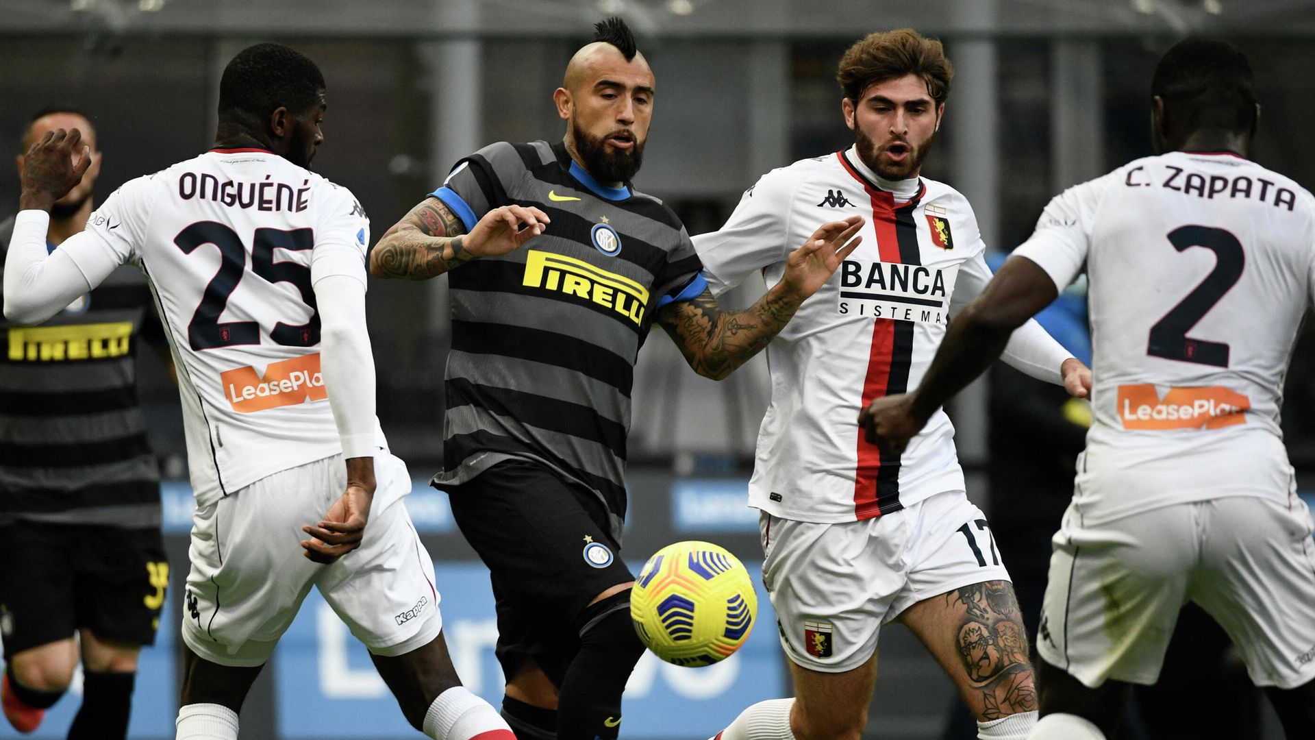 Inter Milan's Chilean midfielder Arturo Vidal (C) challenges Genoa's Cameroonian defender Jerome Onguene (L), Genoa's Italian midfielder Manolo Portanova (2ndR) and Genoa's Colombian defender Cristian Zapata during the Italian Serie A football match Inter Milan v Genoa on February 28, 2021 at the San Siro stadium in Milan. (Photo by Filippo MONTEFORTE / AFP) Inter Milan's Chilean midfielder Arturo Vidal (C) challenges Genoa's Cameroonian defender Jerome Onguene (L), Genoa's Italian midfielder Manolo Portanova (2ndR) and Genoa's Colombian defender Cristian Zapata during the Italian Serie A football match Inter Milan v Genoa on February 28, 2021 at the San Siro stadium in Milan. (Photo by Filippo MONTEFORTE / AFP) - РИА Новости, 1920, 28.02.2021