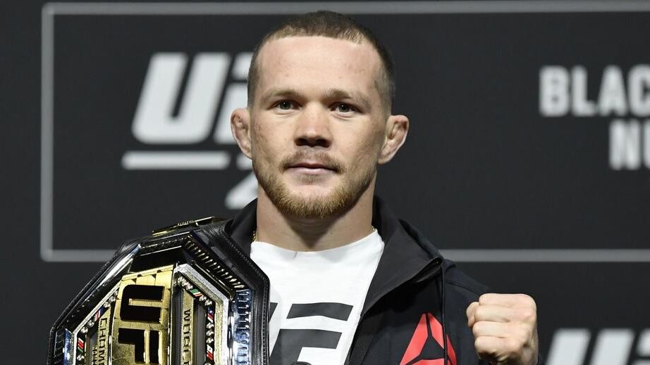 Петр Ян с чемпионским поясом UFC Петр Ян с чемпионским поясом UFC - РИА Новости, 1920, 07.03.2021