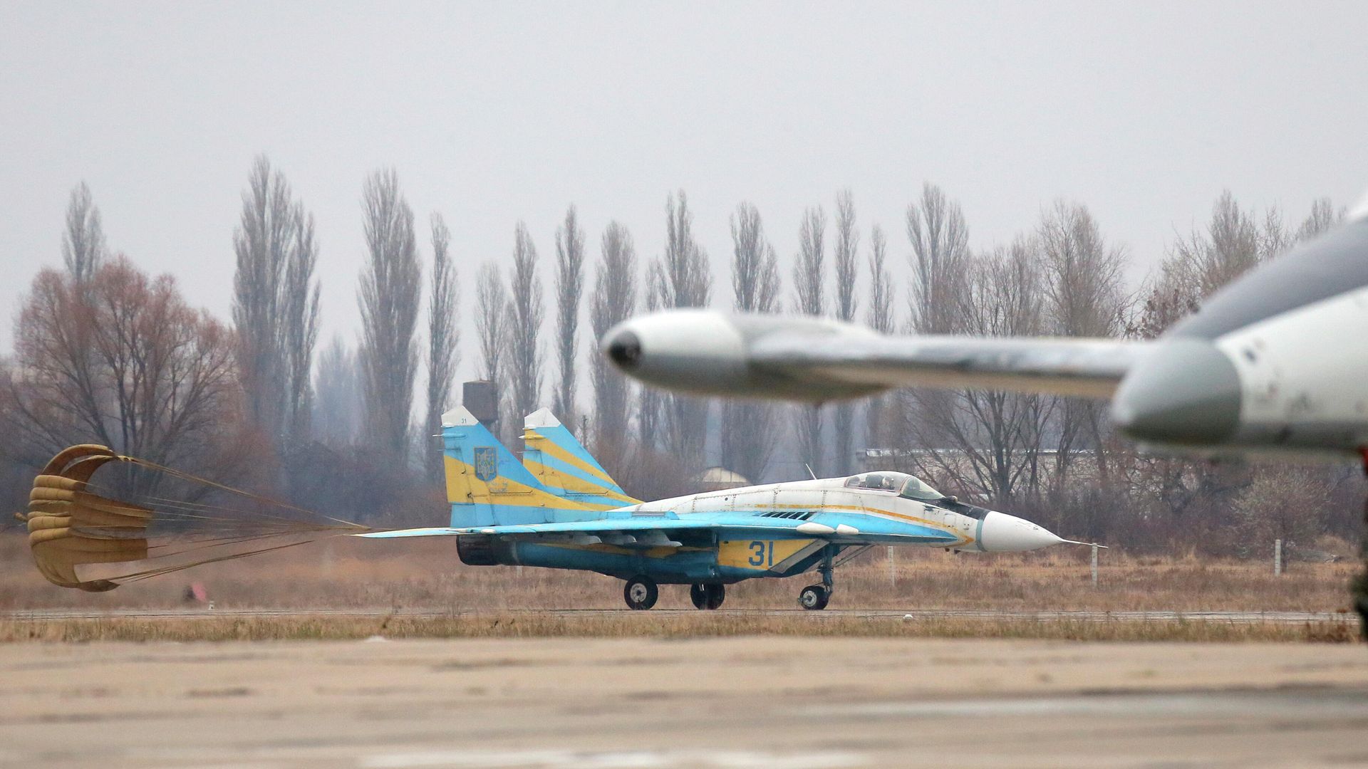 Истребитель Миг-29 на авиабазе недалеко от Киева Истребитель Миг-29 на авиабазе недалеко от Киева - РИА Новости, 1920, 20.12.2021