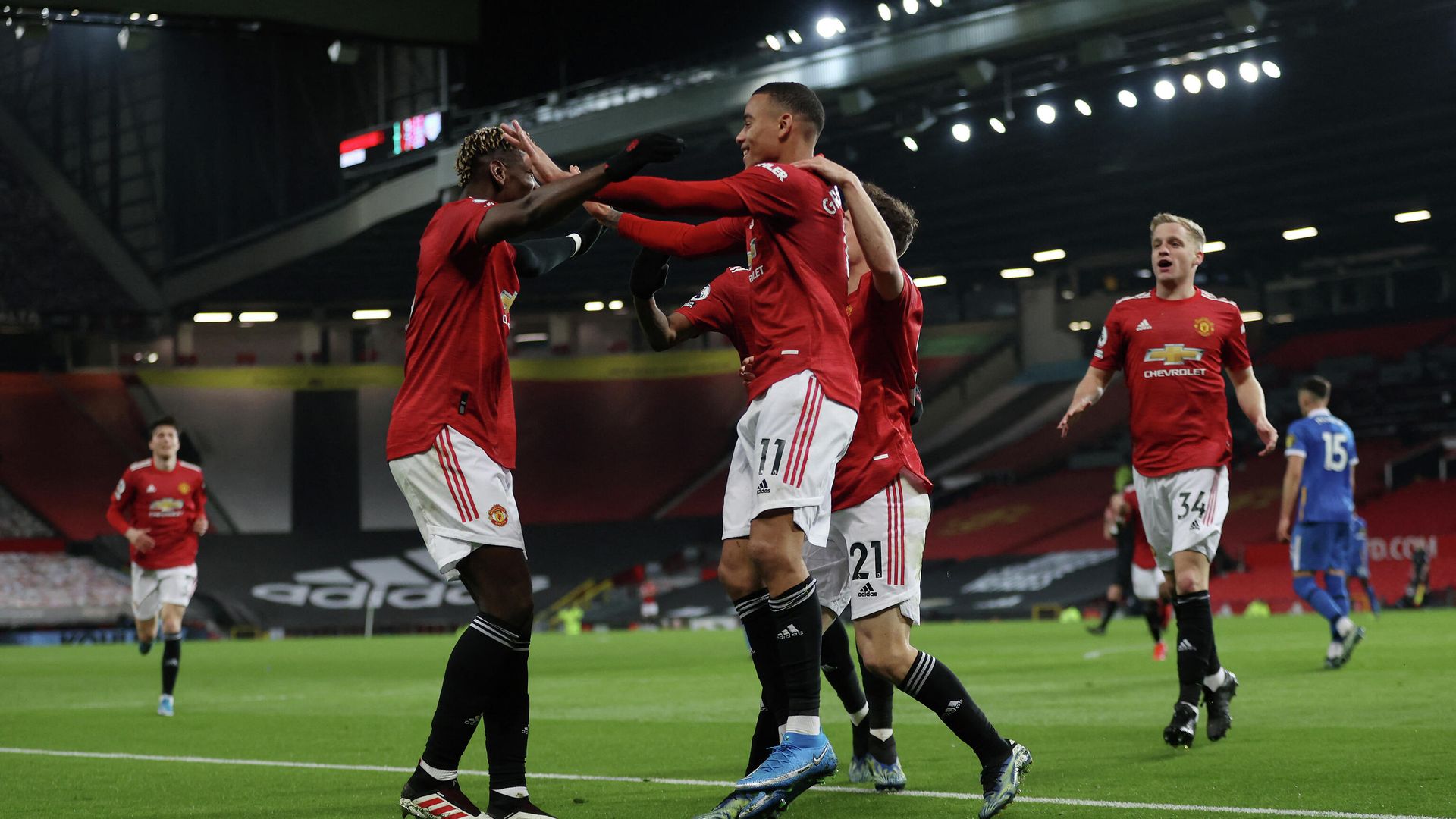 Manchester United's English striker Mason Greenwood celebrates scoring his team's second goal with teammates during the English Premier League football match between Manchester United and Brighton and Hove Albion at Old Trafford in Manchester, north west England, on April 4, 2021. (Photo by Clive Brunskill / POOL / AFP) / RESTRICTED TO EDITORIAL USE. No use with unauthorized audio, video, data, fixture lists, club/league logos or 'live' services. Online in-match use limited to 120 images. An additional 40 images may be used in extra time. No video emulation. Social media in-match use limited to 120 images. An additional 40 images may be used in extra time. No use in betting publications, games or single club/league/player publications. / Manchester United's English striker Mason Greenwood celebrates scoring his team's second goal with teammates during the English Premier League football match between Manchester United and Brighton and Hove Albion at Old Trafford in Manchester, north west England, on April 4, 2021. (Photo by Clive Brunskill / POOL / AFP) / RESTRICTED TO EDITORIAL USE. No use with unauthorized audio, video, data, fixture lists, club/league logos or 'live' services. Online in-match use limited to 120 images. An additional 40 images may be used in extra time. No video emulation. Social media in-match use limited to 120 images. An additional 40 images may be used in extra time. No use in betting publications, games or single club/league/player publications. / - РИА Новости, 1920, 04.04.2021
