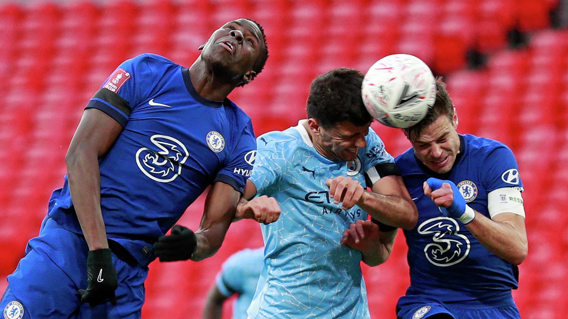 Manchester City's Spanish midfielder Rodrigo (C) vies with Chelsea's French defender Kurt Zouma (L) and Chelsea's Spanish defender Cesar Azpilicueta (R) during the English FA Cup semi-final football match between Chelsea and Manchester City at Wembley Stadium in north west London on April 17, 2021. (Photo by Ian Walton / POOL / AFP) / RESTRICTED TO EDITORIAL USE. No use with unauthorized audio, video, data, fixture lists, club/league logos or 'live' services. Online in-match use limited to 120 images. An additional 40 images may be used in extra time. No video emulation. Social media in-match use limited to 120 images. An additional 40 images may be used in extra time. No use in betting publications, games or single club/league/player publications. / Manchester City's Spanish midfielder Rodrigo (C) vies with Chelsea's French defender Kurt Zouma (L) and Chelsea's Spanish defender Cesar Azpilicueta (R) during the English FA Cup semi-final football match between Chelsea and Manchester City at Wembley Stadium in north west London on April 17, 2021. (Photo by Ian Walton / POOL / AFP) / RESTRICTED TO EDITORIAL USE. No use with unauthorized audio, video, data, fixture lists, club/league logos or 'live' services. Online in-match use limited to 120 images. An additional 40 images may be used in extra time. No video emulation. Social media in-match use limited to 120 images. An additional 40 images may be used in extra time. No use in betting publications, games or single club/league/player publications. / - РИА Новости, 1920, 17.04.2021
