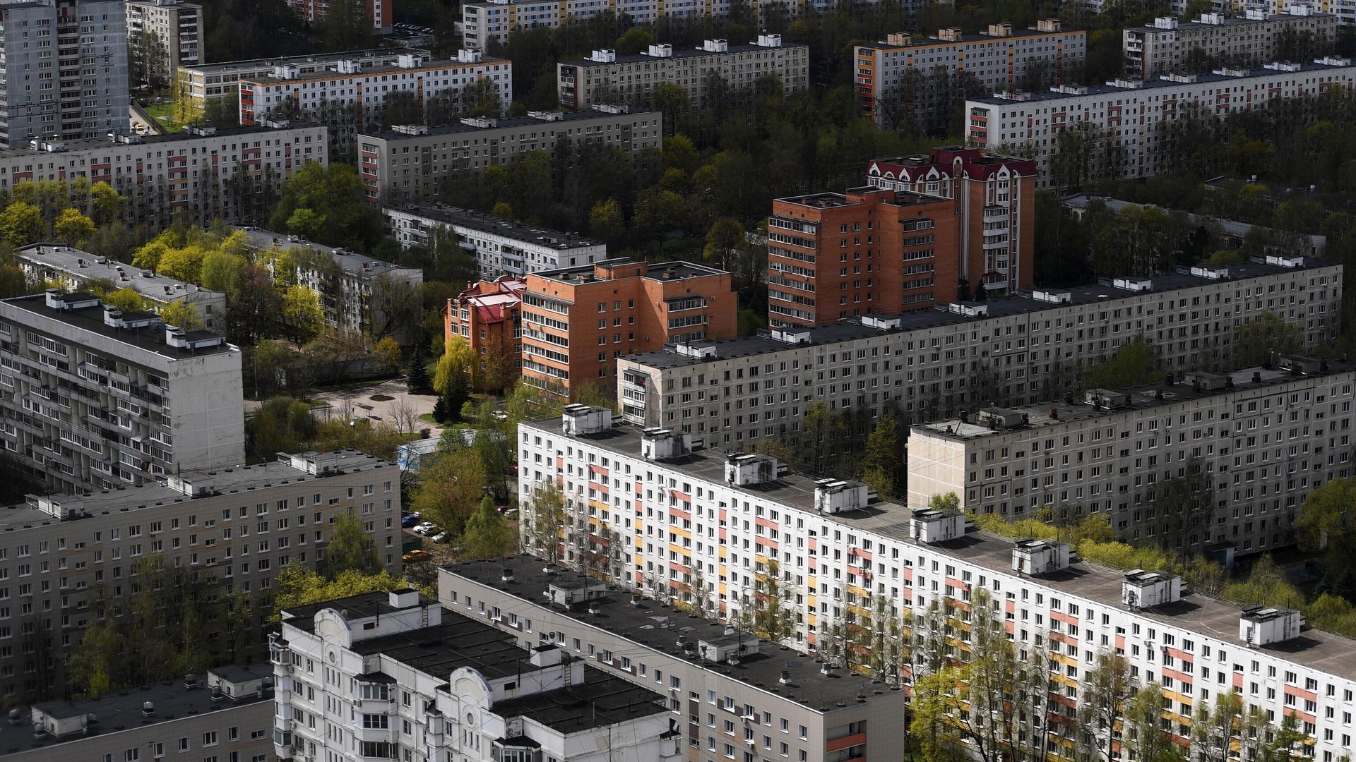 Жилые дома в одном из районов Москвы Жилые дома в одном из районов Москвы - РИА Новости, 1920, 24.10.2025