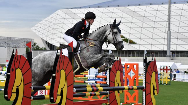 Britain's Kate French jumps during women's individual equestrian event during the UIPM World Cup modern pentathlon test event for the Tokyo 2020 Olympic Games at the AGF field, next to the Musashino Forest Sport Plaza in Tokyo on June 28, 2019. (Photo by Toshifumi KITAMURA / AFP)