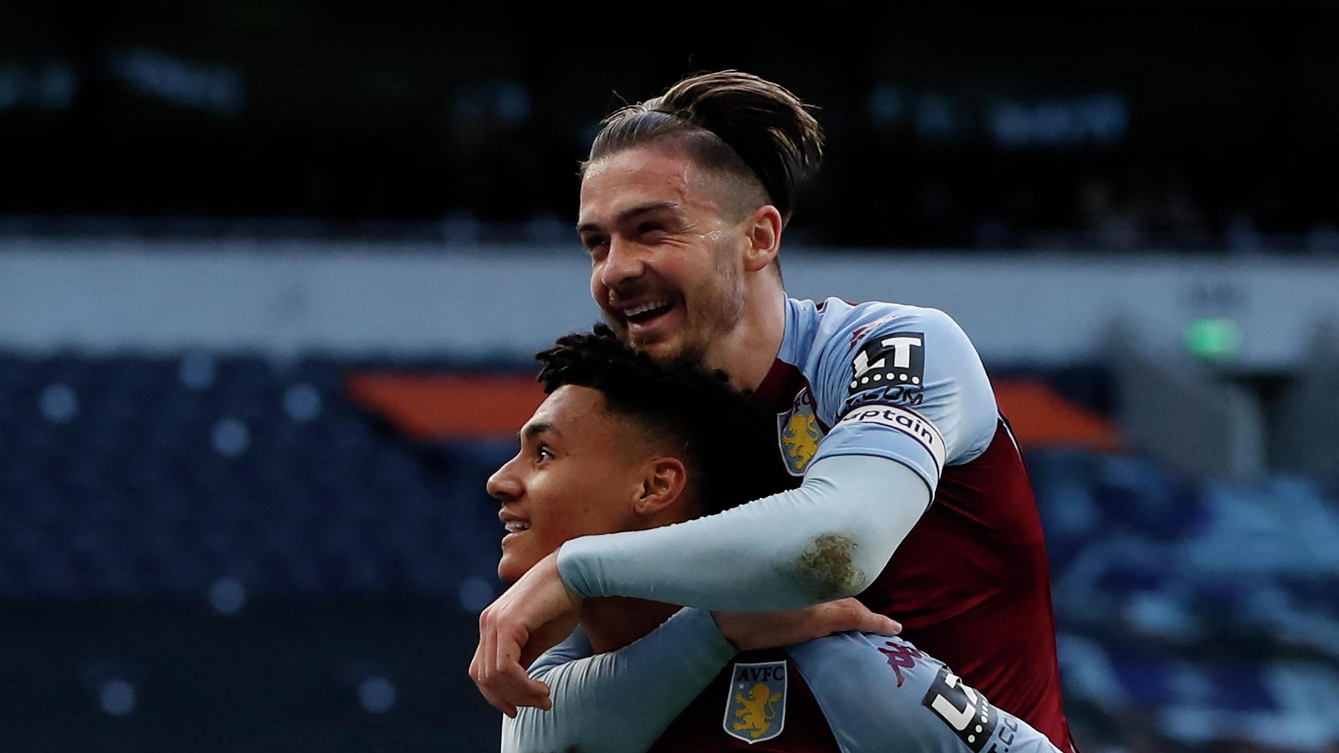 Aston Villa's English striker Ollie Watkins (L) celebrates scoring his team's second goal with Aston Villa's English midfielder Jack Grealish during the English Premier League football match between Tottenham Hotspur and Aston Villa at Tottenham Hotspur Stadium in London, on May 19, 2021. (Photo by PAUL CHILDS / POOL / AFP) / RESTRICTED TO EDITORIAL USE. No use with unauthorized audio, video, data, fixture lists, club/league logos or 'live' services. Online in-match use limited to 120 images. An additional 40 images may be used in extra time. No video emulation. Social media in-match use limited to 120 images. An additional 40 images may be used in extra time. No use in betting publications, games or single club/league/player publications. / Aston Villa's English striker Ollie Watkins (L) celebrates scoring his team's second goal with Aston Villa's English midfielder Jack Grealish during the English Premier League football match between Tottenham Hotspur and Aston Villa at Tottenham Hotspur Stadium in London, on May 19, 2021. (Photo by PAUL CHILDS / POOL / AFP) / RESTRICTED TO EDITORIAL USE. No use with unauthorized audio, video, data, fixture lists, club/league logos or 'live' services. Online in-match use limited to 120 images. An additional 40 images may be used in extra time. No video emulation. Social media in-match use limited to 120 images. An additional 40 images may be used in extra time. No use in betting publications, games or single club/league/player publications. / - РИА Новости, 1920, 19.05.2021