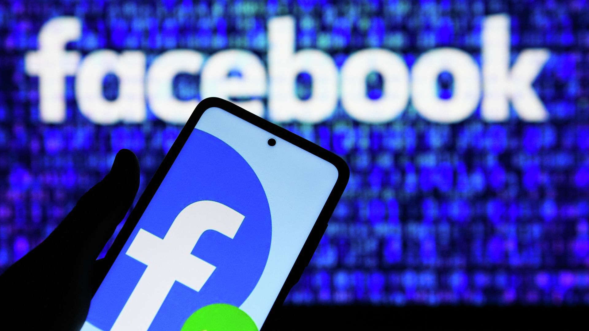 Приложение социальной сети Facebook в мобильном телефоне Приложение социальной сети Facebook в мобильном телефоне - РИА Новости, 1920, 05.10.2021