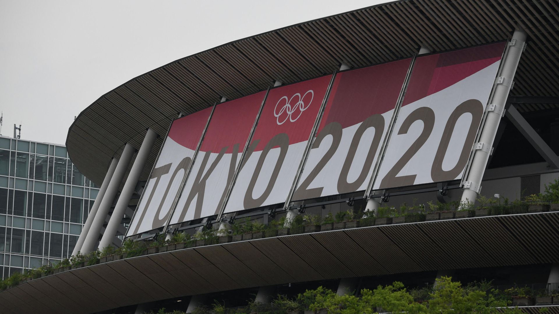 Логотип Олимпийских игр 2020 года на Национальном стадионе в Токио Логотип Олимпийских игр 2020 года на Национальном стадионе в Токио - РИА Новости, 1920, 10.07.2021