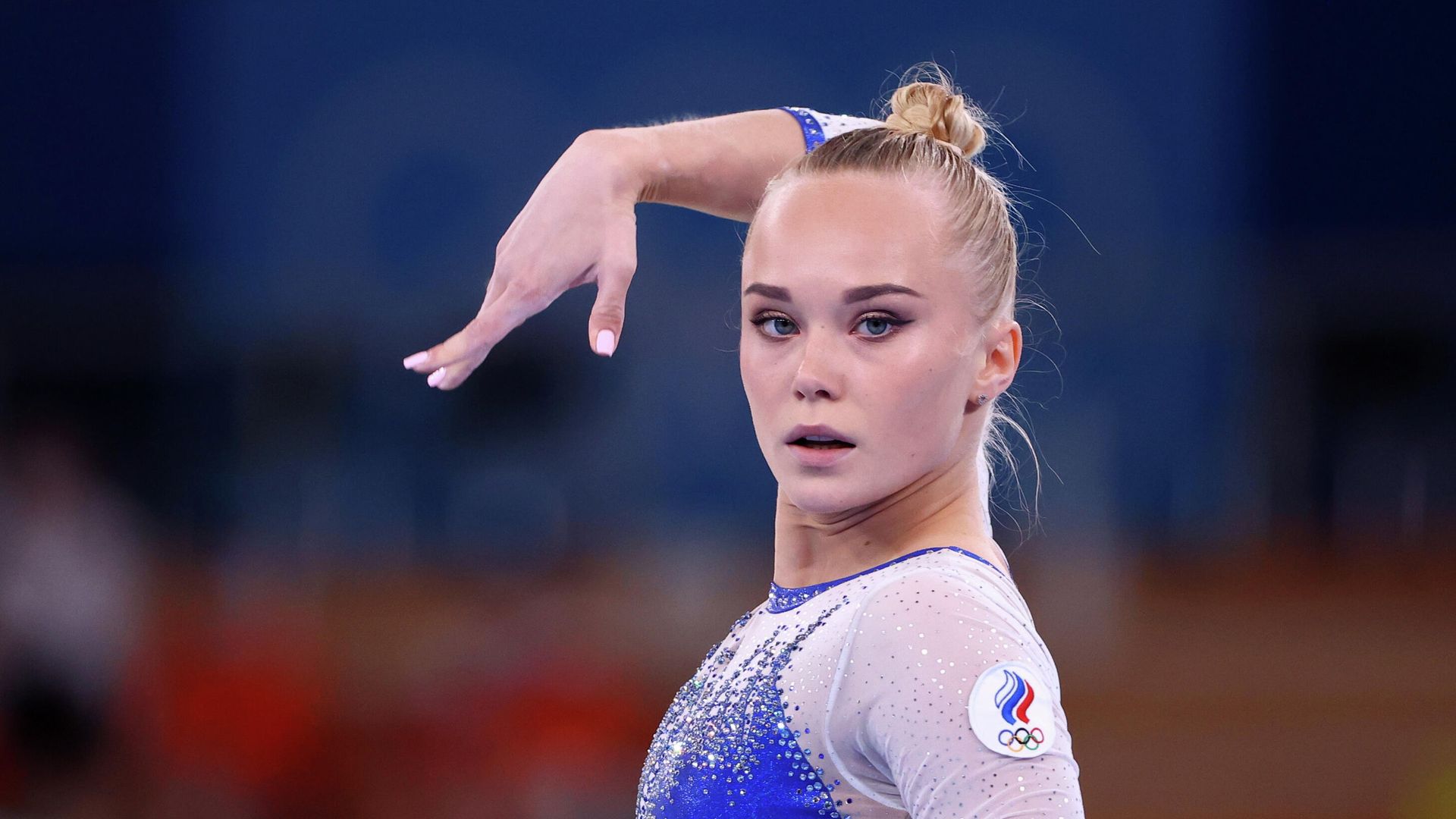 Российская спортсменка, член сборной России (команда ОКР) Ангелина Мельникова перед выступлением в командном многоборье среди женщин на соревнованиях по спортивной гимнастике на XXXII летних Олимпийских играх в Токио Российская спортсменка, член сборной России (команда ОКР) Ангелина Мельникова перед выступлением в командном многоборье среди женщин на соревнованиях по спортивной гимнастике на XXXII летних Олимпийских играх в Токио - РИА Новости, 1920, 27.07.2021