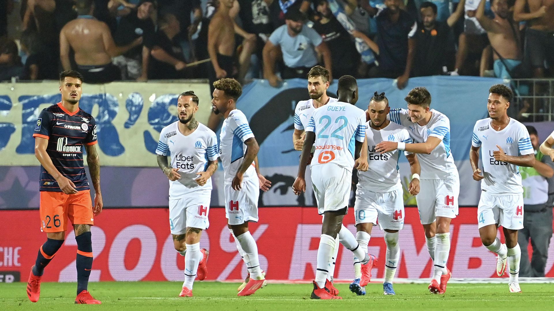 Marseille's players react after scoring a goal during the French L1 football match between Montpellier and Marseille at the Mosson stadium in Montpellier, southern France on August 8, 2021. (Photo by Pascal GUYOT / AFP) Marseille's players react after scoring a goal during the French L1 football match between Montpellier and Marseille at the Mosson stadium in Montpellier, southern France on August 8, 2021. (Photo by Pascal GUYOT / AFP) - РИА Новости, 1920, 09.08.2021