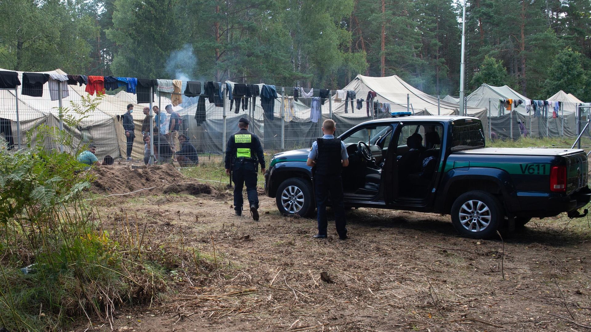 Полицейские возле лагеря мигрантов на литовско-белорусской границе - РИА Новости, 1920, 23.08.2021