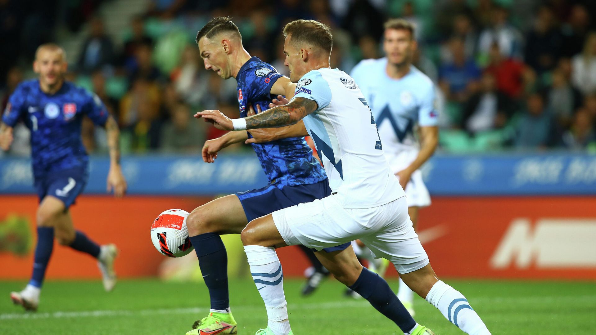 Soccer Football - World Cup - UEFA Qualifiers - Group H - Slovenia v Slovakia - Stozice Stadium, Ljubljana, Slovenia - September 1, 2021 Slovakia's Robert Bozenik in action with Slovenia's Jure Balkovec REUTERS/Borut Zivulovic Soccer Football - World Cup - UEFA Qualifiers - Group H - Slovenia v Slovakia - Stozice Stadium, Ljubljana, Slovenia - September 1, 2021 Slovakia's Robert Bozenik in action with Slovenia's Jure Balkovec REUTERS/Borut Zivulovic - РИА Новости, 1920, 01.09.2021