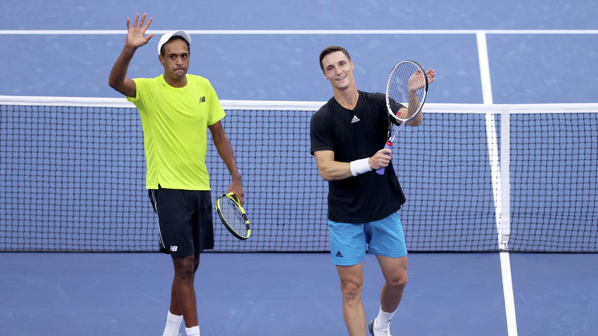 NEW YORK, NEW YORK - SEPTEMBER 09: Joe Salisbury of Great Britain and Rajeev Ram of the United States celebrate match point against Steve Johnson of the United States and Sam Querrey of the United States during their Men’s Doubles semifinals match on Day Eleven of the 2021 US Open at the USTA Billie Jean King National Tennis Center on September 09, 2021 in the Flushing neighborhood of the Queens borough of New York City. Matthew Stockman/Getty Images/AFP (Photo by MATTHEW STOCKMAN / GETTY IMAGES NORTH AMERICA / Getty Images via AFP) NEW YORK, NEW YORK - SEPTEMBER 09: Joe Salisbury of Great Britain and Rajeev Ram of the United States celebrate match point against Steve Johnson of the United States and Sam Querrey of the United States during their Men’s Doubles semifinals match on Day Eleven of the 2021 US Open at the USTA Billie Jean King National Tennis Center on September 09, 2021 in the Flushing neighborhood of the Queens borough of New York City. Matthew Stockman/Getty Images/AFP (Photo by MATTHEW STOCKMAN / GETTY IMAGES NORTH AMERICA / Getty Images via AFP) - РИА Новости, 1920, 10.09.2021