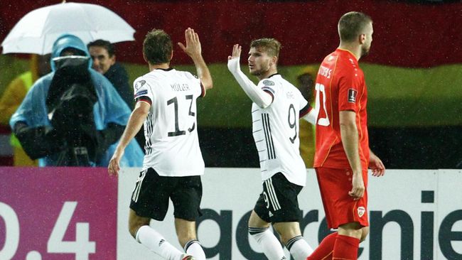 Soccer Football - World Cup - UEFA Qualifiers - Group J - North Macedonia v Germany - Toshe Proeski Arena, Skopje, North Macedonia - October 11, 2021 Germany's Timo Werner and Thomas Muller celebrate their first goal scored by Kai Havertz REUTERS/Ognen Teofilovski