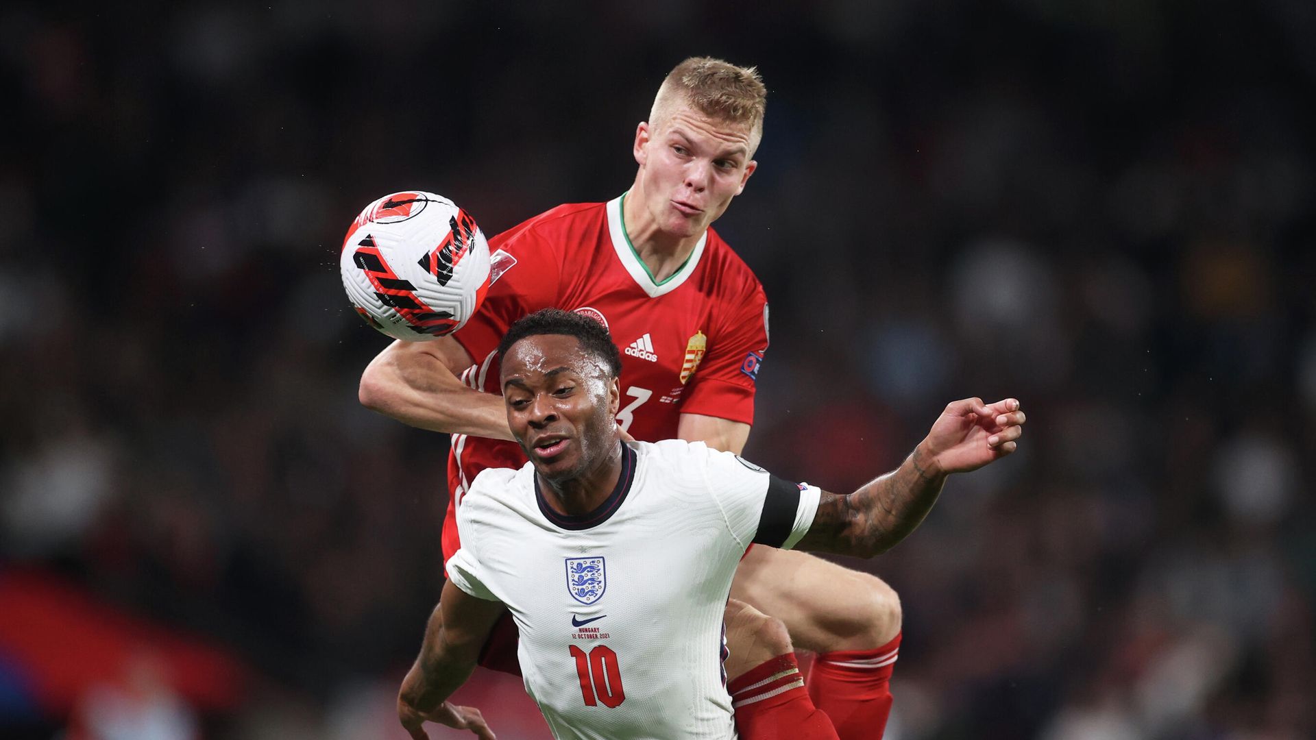 Soccer Football - World Cup - UEFA Qualifiers - Group I - England v Hungary - Wembley Stadium, London, Britain - October 12, 2021 Hungary's Andras Schafer in action with England's Raheem Sterling Action Images via Reuters/Carl Recine Soccer Football - World Cup - UEFA Qualifiers - Group I - England v Hungary - Wembley Stadium, London, Britain - October 12, 2021 Hungary's Andras Schafer in action with England's Raheem Sterling Action Images via Reuters/Carl Recine - РИА Новости, 1920, 13.10.2021