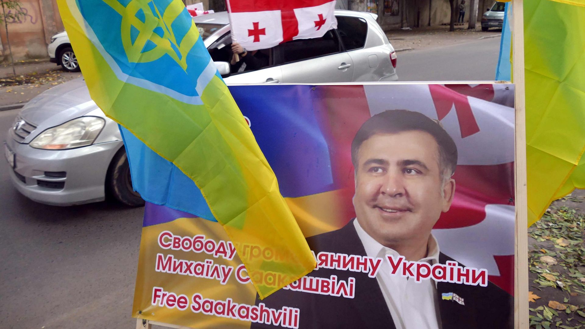 Участники акции в поддержку Михаила Саакашвили проехали на автомобилях с украинскими и грузинскими флагами по улицам Одессы Участники акции в поддержку Михаила Саакашвили проехали на автомобилях с украинскими и грузинскими флагами по улицам Одессы - РИА Новости, 1920, 13.11.2021