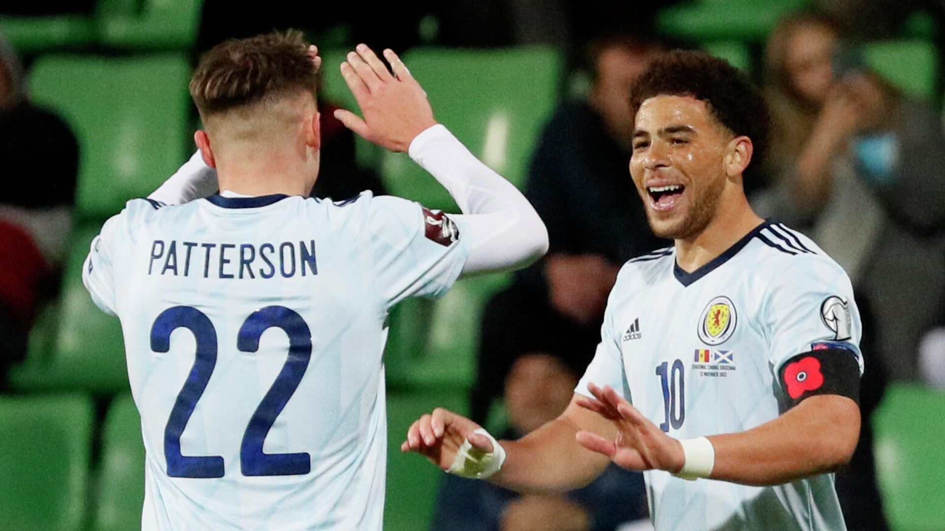 Soccer Football - World Cup - UEFA Qualifiers - Group F - Moldova v Scotland - Zimbru Stadium, Chisinau, Moldova - November 12, 2021 Scotland's Che Adams celebrates scoring their second goal with Nathan Patterson REUTERS/Gleb Garanich Soccer Football - World Cup - UEFA Qualifiers - Group F - Moldova v Scotland - Zimbru Stadium, Chisinau, Moldova - November 12, 2021 Scotland's Che Adams celebrates scoring their second goal with Nathan Patterson REUTERS/Gleb Garanich - РИА Новости, 1920, 12.11.2021