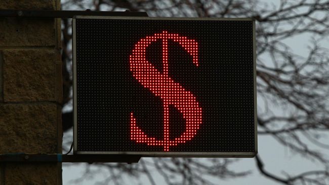 Электронное табло со знаком доллара
