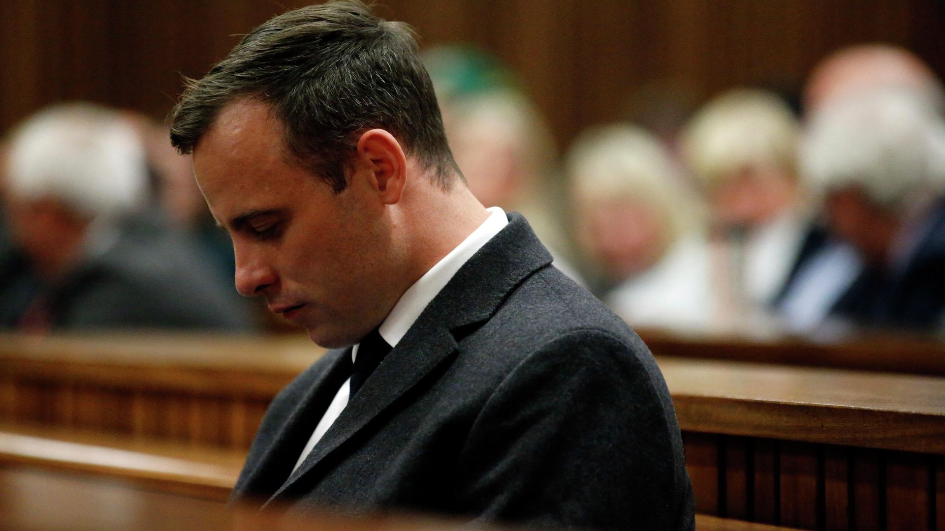 Paralympian athlete Oscar Pistorius (L), accused of the murder of his girlfriend Reeva Steenkamp three years ago, looks on during the hearing in his murder trail at the High Court in Pretoria, on July 6, 2016. - Paralympian Oscar Pistorius will learn on July 6 how long he will spend in jail when a judge sentences him for murdering his girlfriend Reeva Steenkamp three years ago. Pistorius was freed from prison in the South African capital Pretoria last October after serving one year of a five-year term for culpable homicide -- the equivalent of manslaughter. (Photo by MARCO LONGARI / POOL / AFP) Paralympian athlete Oscar Pistorius (L), accused of the murder of his girlfriend Reeva Steenkamp three years ago, looks on during the hearing in his murder trail at the High Court in Pretoria, on July 6, 2016. - Paralympian Oscar Pistorius will learn on July 6 how long he will spend in jail when a judge sentences him for murdering his girlfriend Reeva Steenkamp three years ago. Pistorius was freed from prison in the South African capital Pretoria last October after serving one year of a five-year term for culpable homicide -- the equivalent of manslaughter. (Photo by MARCO LONGARI / POOL / AFP) - РИА Новости, 1920, 29.11.2021