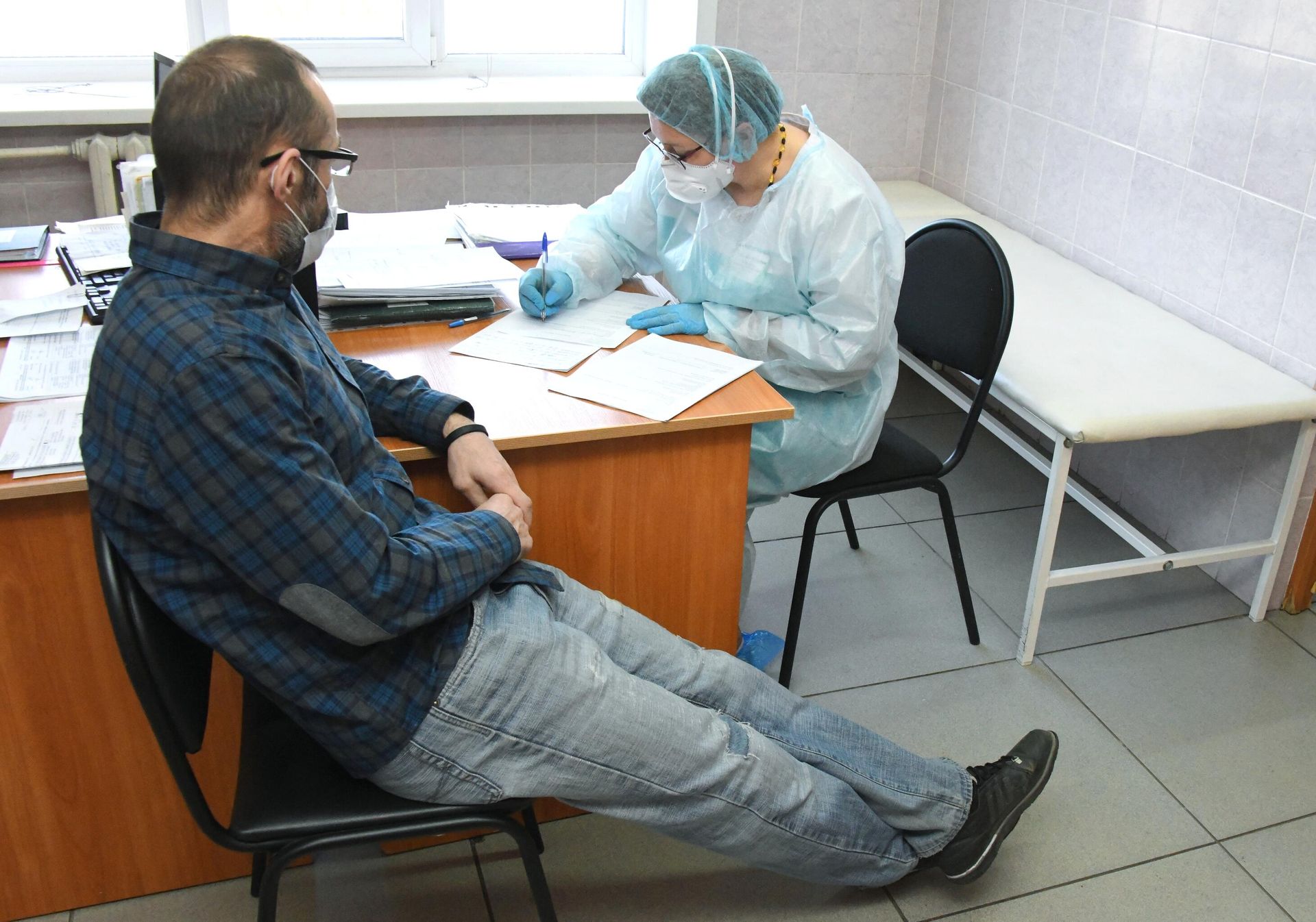 Мужчина на приеме у врача Мужчина на приеме у врача - РИА Новости, 1920, 01.12.2022