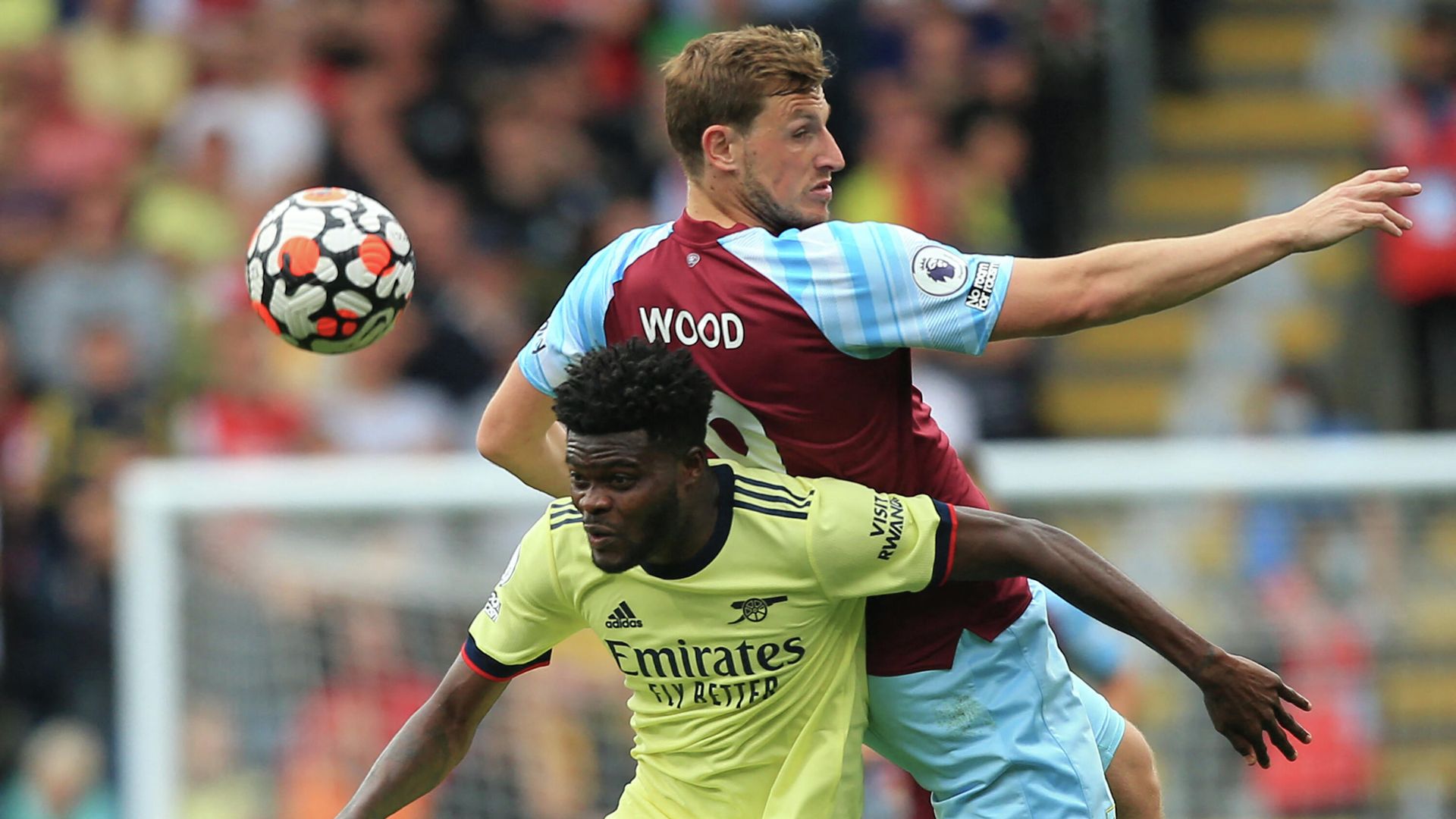 Arsenal's Ghanaian midfielder Thomas Partey (L) vies with Burnley's New Zealand striker Chris Wood (R) during the English Premier League football match between Burnley and Arsenal at Turf Moor in Burnley, north west England on September 18, 2021. (Photo by Lindsey Parnaby / AFP) / RESTRICTED TO EDITORIAL USE. No use with unauthorized audio, video, data, fixture lists, club/league logos or 'live' services. Online in-match use limited to 120 images. An additional 40 images may be used in extra time. No video emulation. Social media in-match use limited to 120 images. An additional 40 images may be used in extra time. No use in betting publications, games or single club/league/player publications. / Arsenal's Ghanaian midfielder Thomas Partey (L) vies with Burnley's New Zealand striker Chris Wood (R) during the English Premier League football match between Burnley and Arsenal at Turf Moor in Burnley, north west England on September 18, 2021. (Photo by Lindsey Parnaby / AFP) / RESTRICTED TO EDITORIAL USE. No use with unauthorized audio, video, data, fixture lists, club/league logos or 'live' services. Online in-match use limited to 120 images. An additional 40 images may be used in extra time. No video emulation. Social media in-match use limited to 120 images. An additional 40 images may be used in extra time. No use in betting publications, games or single club/league/player publications. / - РИА Новости, 1920, 06.01.2022